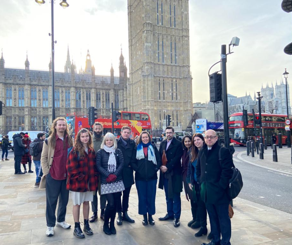 NCAN representatives standing in front of the Houses of Parliament